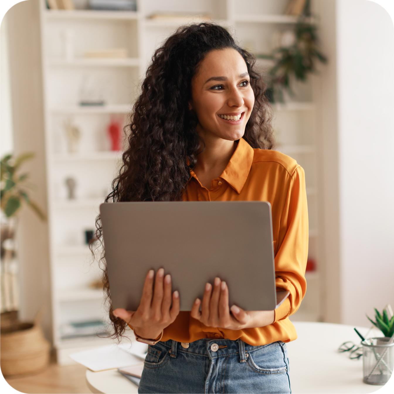 Smiling woman on laptop-1